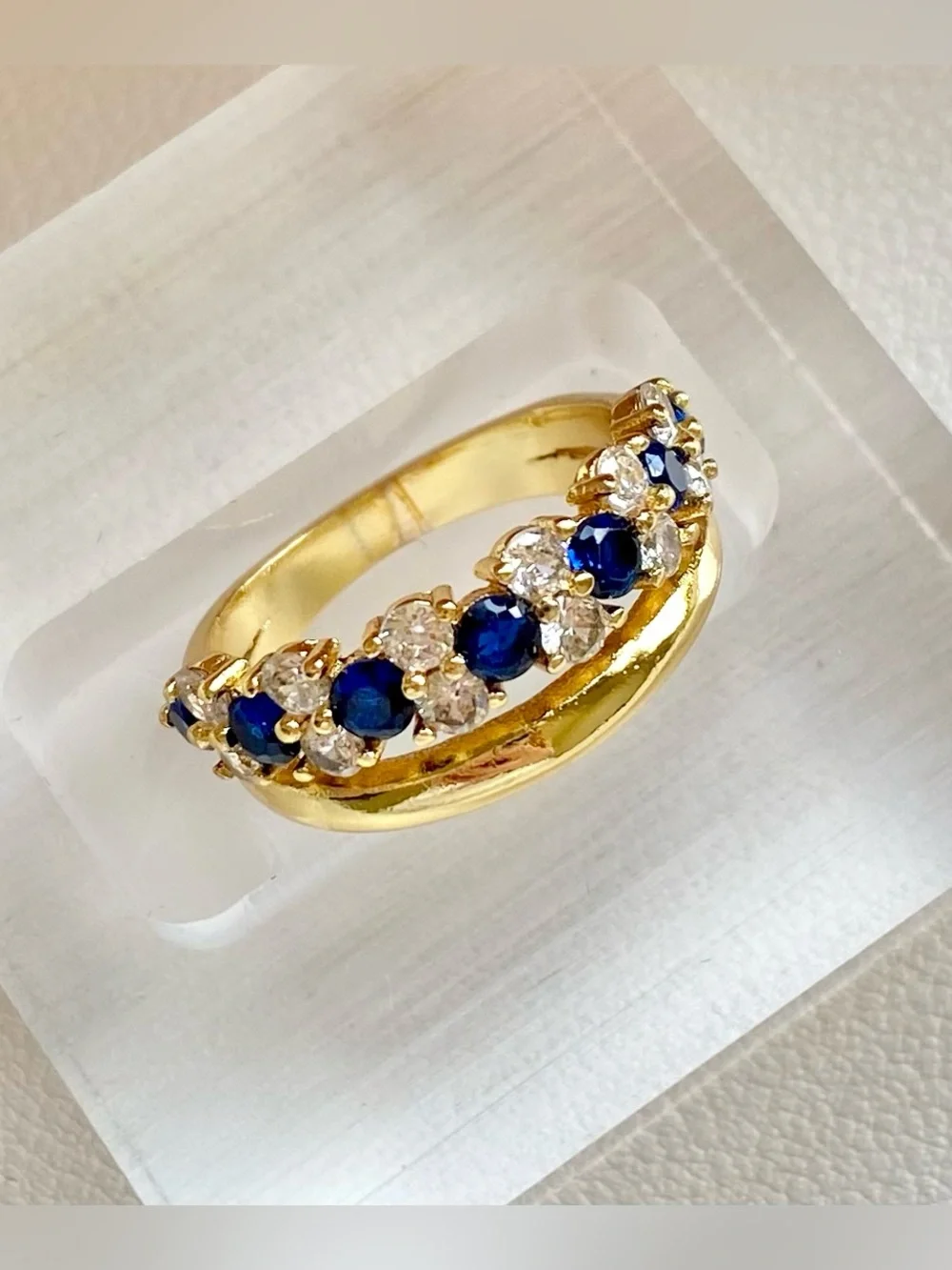 Gold Band Ring with Blue Sapphire and White CZ Accents